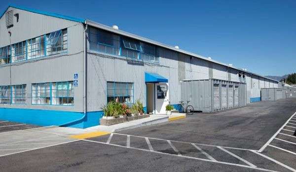 Parking lot and front door of storage facility office