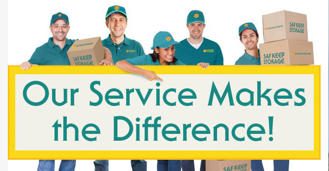 Saf Keep Employees with boxes and sign that says Our Service Makes the Difference